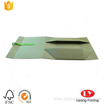 Flat foldable cardboard gift box with ribbon